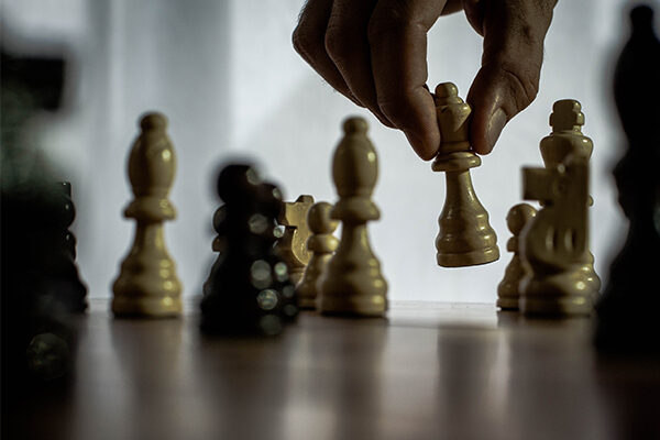 Playing,Chess Ruggie Wealth Management financial planning services including investments
