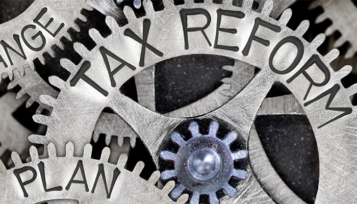 Macro,Photo,Of,Tooth,Wheel,Mechanism,With,Tax,Reform,,Collect, Ruggie Wealth Management Tax Planning