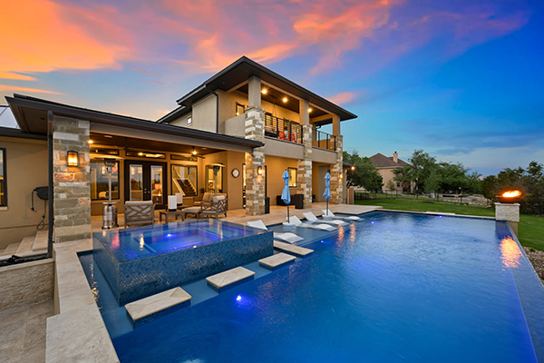 A,Luxury,Pool,At,Sunset Ruggie Wealth Management Financial Planning Services