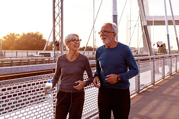 Senior,Adults,Jogging,At,The,End,Of,The,Day,In Ruggie Wealth Management Retirement Planning